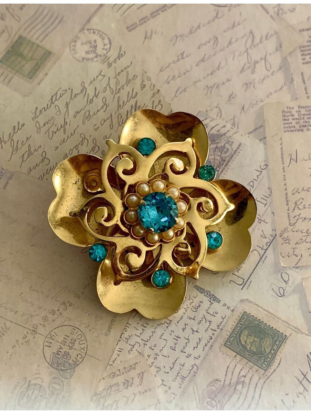 Vintage Chic Gold Flower Brooch with Sparkling Blue Gems & Pearls
